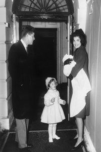 Jackie Kennedy, shown with her family at the White House in 1961, was so well-loved by the press and the public that she hired a press secretary to handle the media attention.