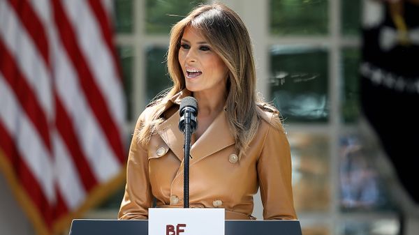 Women talking into microphone as adult.