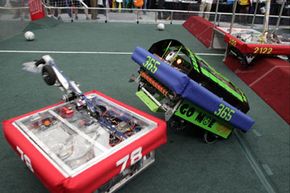 Machines clash at the FIRST Robotics Competition.
