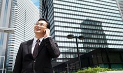 Man looking at building. 