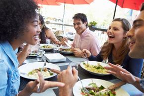 Gabbing while you nosh with friends? It could lead to gas after your meal.
