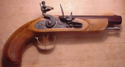 Rifle crafted from wood and metal material.