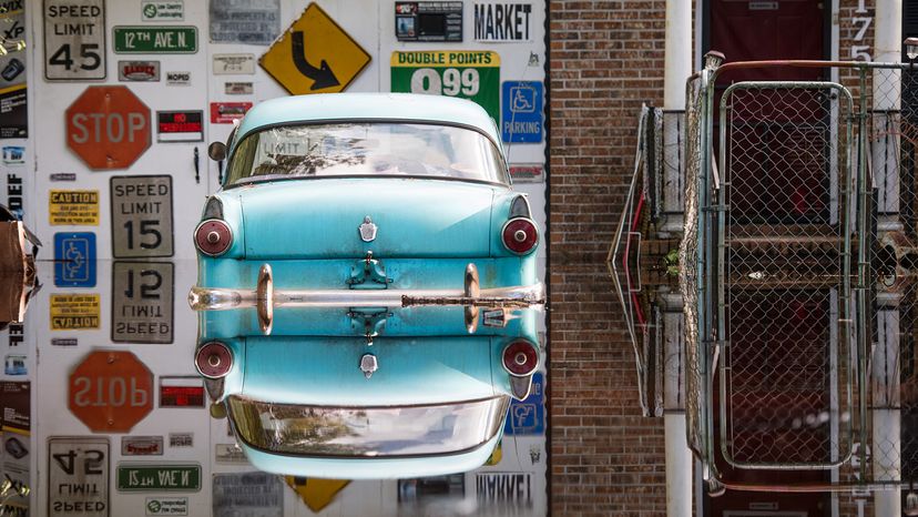 Antique car is inundated by floodwaters