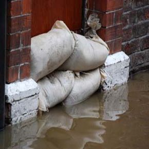 Sandbagging can help prevent water from entering a house.