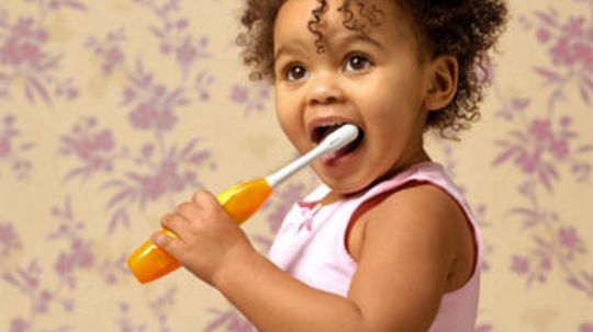 When can you use fluoride toothpaste on toddlers?