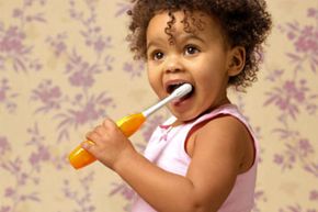 girl brushing teeth