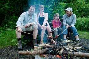 family at campfire