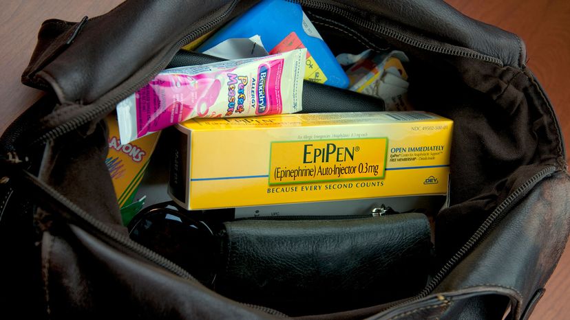If you find out you have a severe food allergy, you should always travel with an emergency treatment like EpiPen. nkbimages/Getty Images