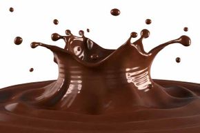 Chocolate eases PMS by releasing mood-altering chemicals in the brain.