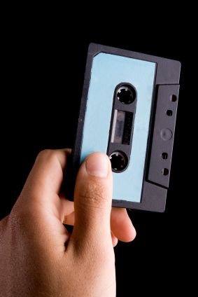 hand holding cassette tape
