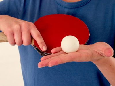 ping pong ball in palm of hand