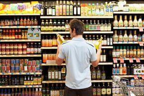 Man in aisle of grocery store