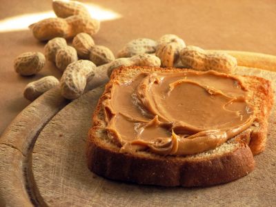 peanut spread on a slice of bread