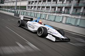 Formula E race cars look similar to the open-wheel, Formula One design we're already familiar with.