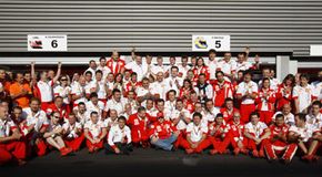 The Ferrari team celebrates after winning the Belgian Grand Prix in September 2007.