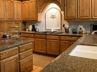 Wooden kitchen with granite worktop