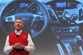 Alan Mulally, CEO of Ford Motor Co., presents the new Ford Sync automotive mobile communications system at the CeBIT technology trade fair on March 1, 2011 in Hanover, Germany.