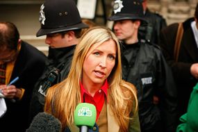 Heather Mills speaks to reporters after her divorce settlement with Sir Paul McCartney in March 2008.
