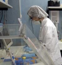 A forensic scientist working in a lab