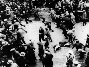 Violent strikes, like this one in Passaic, New Jersey, in 1926, led to new federal labor laws. Depending on your view, the government either protected American workers or leveraged unrest to gain control over business.