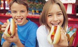 kids with hot dogs