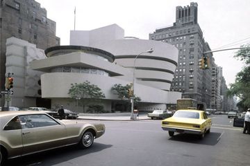 Famous cityscape with car outdoors.