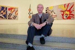 Artist Roy Lichtenstein poses at the Solomon R. Guggenheim Museum in New York City in October 1993. Lichtenstein was a pioneer of the Pop Art movement and best known for his oversized comic book-style images.