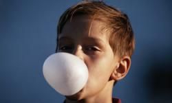 kid blowing bubble