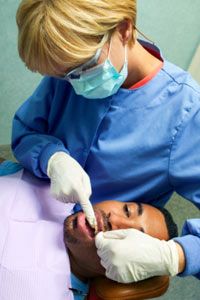 Though you may not realize it, your dentist checks for signs of oral cancer every time you go in for a routine exam.