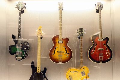 wall of electric guitars