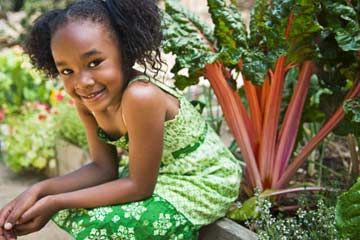 a girl sitting with rhubarb