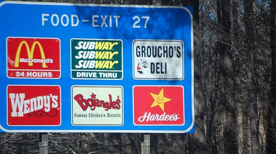 Who Does — and Doesn't — Get Featured on Blue Highway Exit Signs?