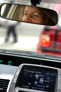 An energy monitor displays a Prius' miles per gallon.