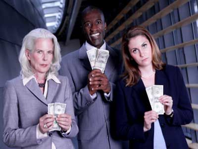 man and women holding cash