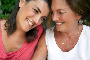 mature woman and daughter in garden