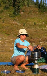 Woman camp cooking