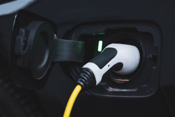 An electric car fuels up by plugging in.
