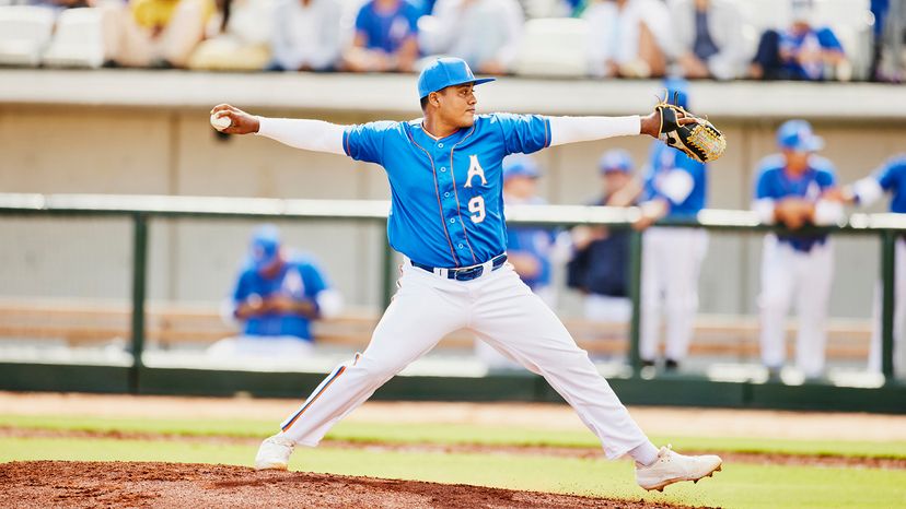 Pitcher about to throw a baseball from the pitcher's mound