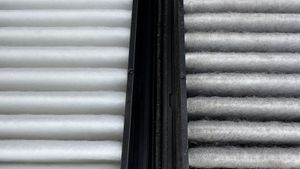 Clean air filter on the left vs. one covered in dust and hair on the right