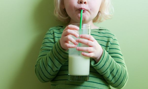 Girl in Green Sipping Green Milkshake