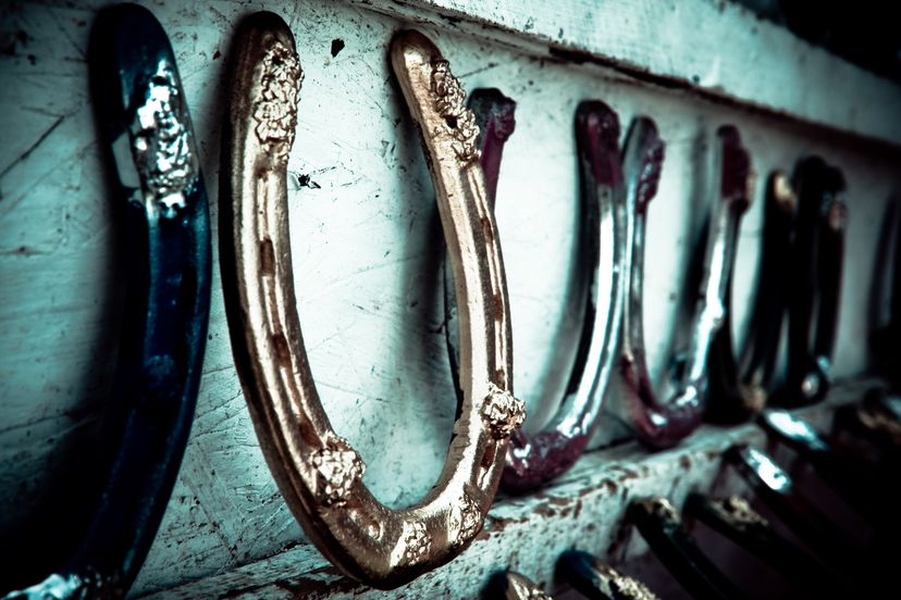 Colorful horseshoes on display and for sale by a local Amish craftsman.