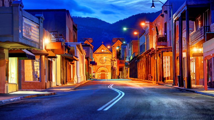 Santa Fe street lit up at dusk