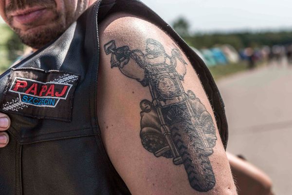Portrait of biker with tattoo