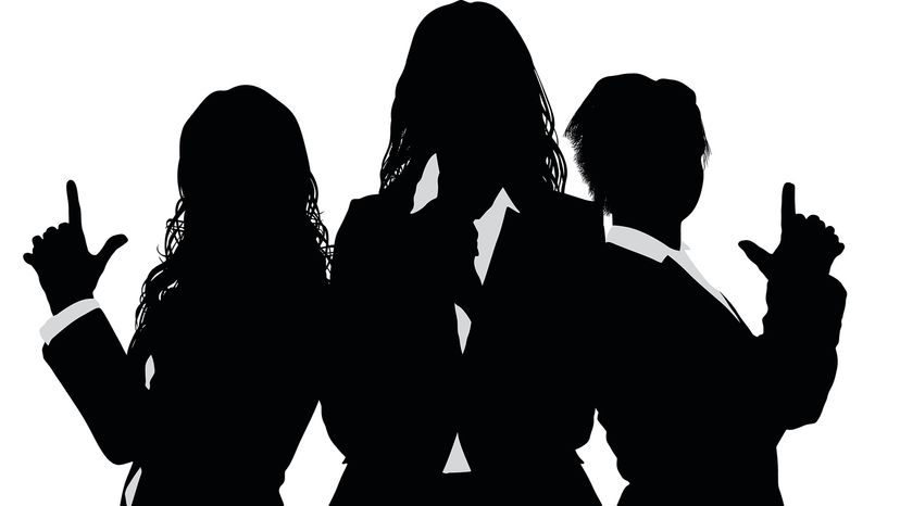 Silhouette of three women posing like Charlie's Angels