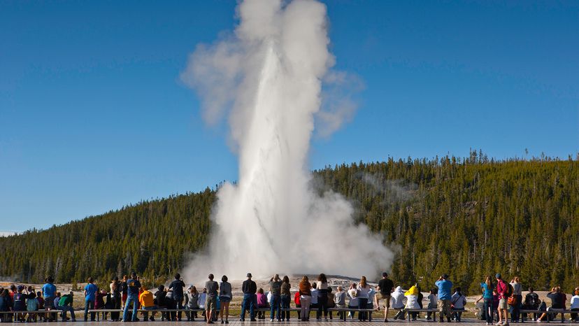 Tourists watching Old Faithful, Yellowstone National Park