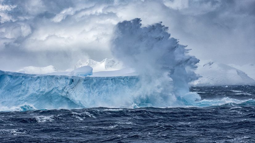 Massive Iceberg floating in the Southern Ocean in Antarctica with stormy seas