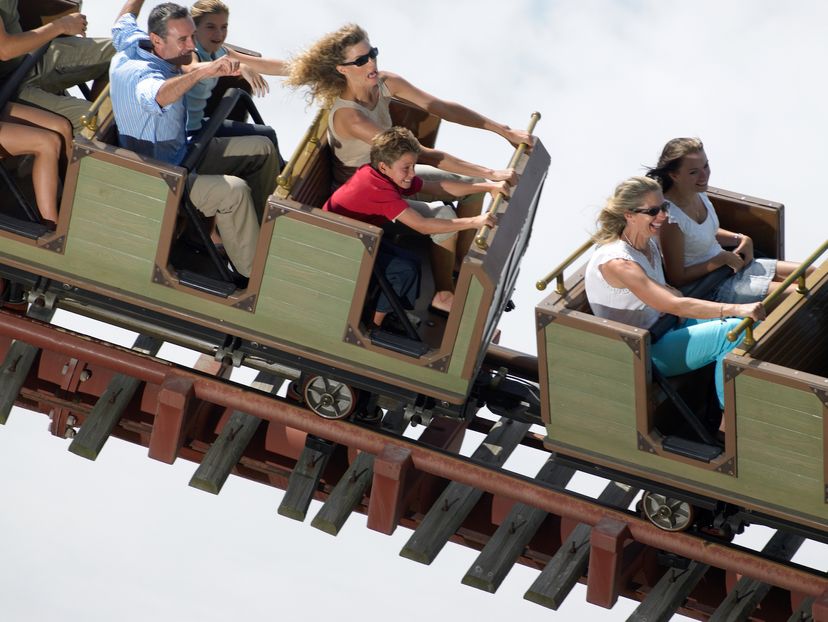 People riding a roller coaster