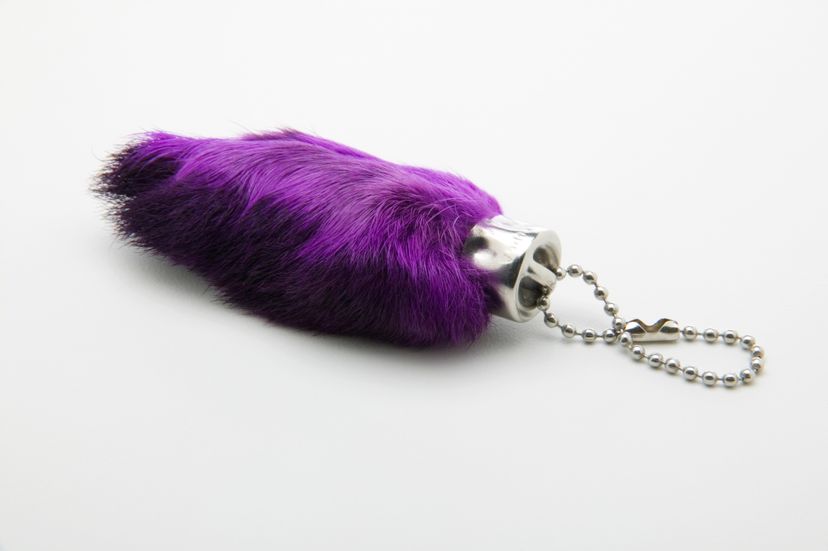 Purple rabbit's foot with a keychain attachment