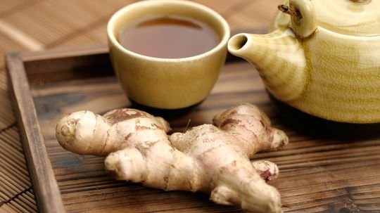 Why does ginger settle an upset stomach?