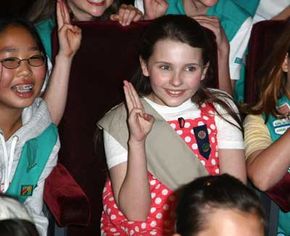 Girls smiling in childhood joy.